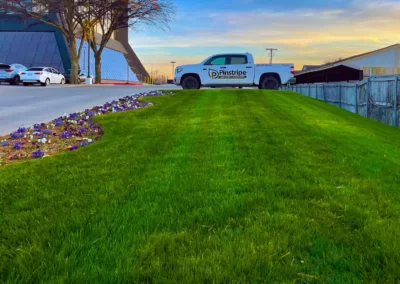 Pinstripe Lawn Care and Landscaping Commercial Mowing with Pinstripe Service Truck