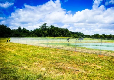 Pinstripe Lawn Care commercial chain link fence.